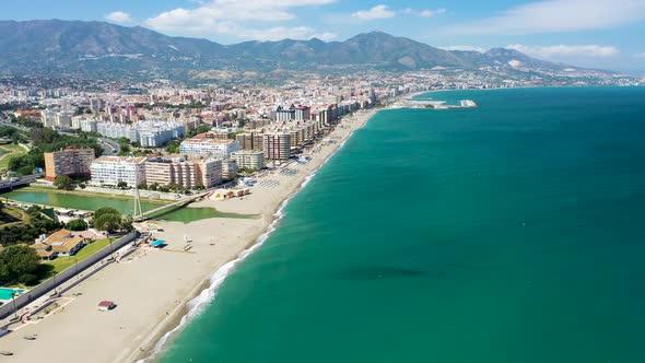 Aerial view of the coastline with beaches and resorts in San Pedro de Alcántara, Malaga, Spain.