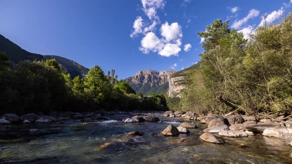 Lopable Timelapse of Clouds Passing Over Monte Pedido Mountains