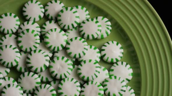 Rotating shot of spearmint hard candies - CANDY SPEARMINT 040