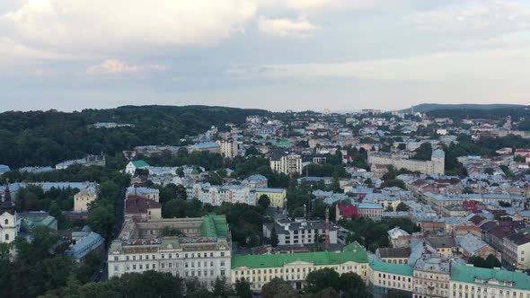 City skyline of old European buildings in Lviv Ukraine during sunset in the summer.