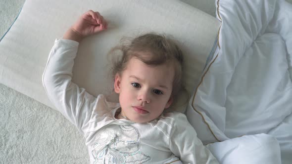 Authentic Close Up Cute Caucasian Little Preschool Toddler Child Girl Sleepy Upon Waking with Teddy