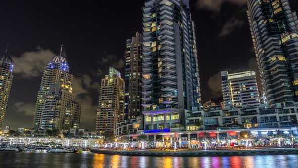 View of Dubai Marina Towers and Canal in Dubai Night Timelapse Hyperlapse