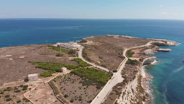 Aerial drone video from eastern Malta, Marsaxlokk area, Il-Hofra l-Kbira bay.