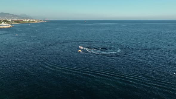 Sports Boat Sails Fast on the Sea Aerial View 4 K