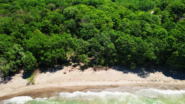 Spectacular Aerial drone video footage of beautiful Lake Erie during summer on a sunny day