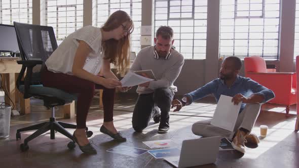 Young creative professionals working in a modern office