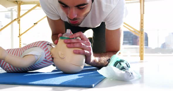 Paramedic during mouth-to-mouth resuscitation training