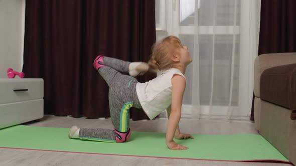 Child Kid Training Gymnastics Stretching at Home Children Girl Making Sport Workout Exercises