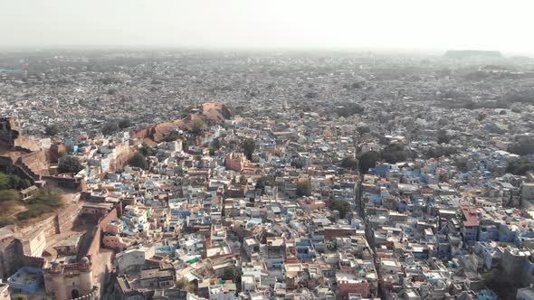 Jodhpur blue city landscape composed by small buildings surrounding Mehrangarh Fort in Rajasthan