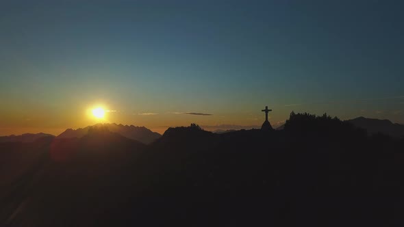 Colorful Autumn Sunset On A Mountain Top With The Cross