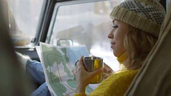 Young Woman Travelling by Car