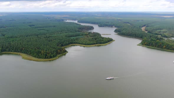 Aerial view of a lake and a forest in Masuria (Mazury) region in Poland, Europe