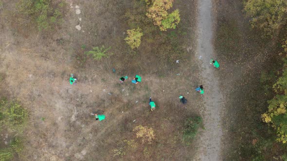 Top View of Multiracial Volunteers Picking Trash