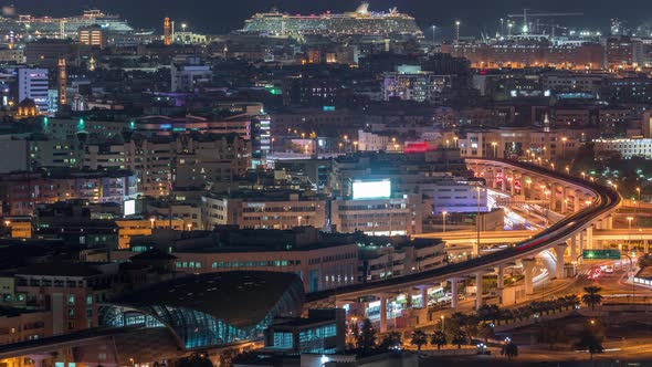 The Rhythm of the City at Night in Dubai Creek Aerial Timelapse