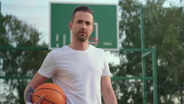 Confident Basketball Player Looking to the Camera