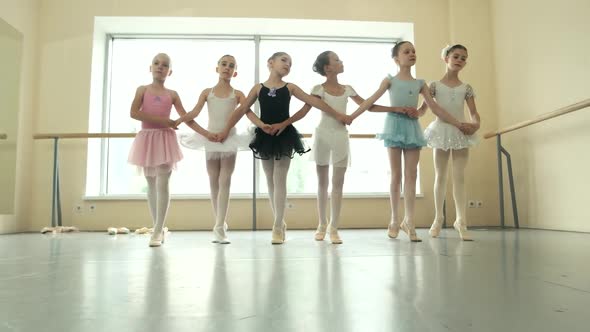 Group of Ballerinas Rehearsing Before Performance