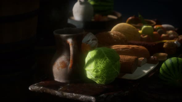 Food Table with Wine Barrels and Some Fruits, Vegetables and Bread alt
