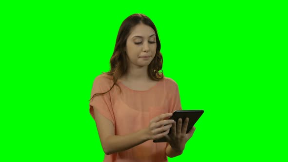 Young woman using digital tablet