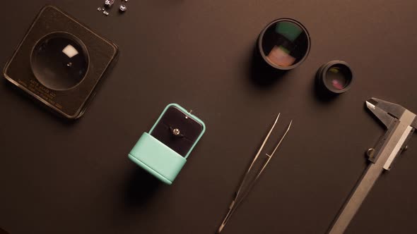 Close Up of Jeweller Tools Lying on Desk