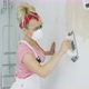 Woman Grinding Wall with Sandpaper - VideoHive Item for Sale