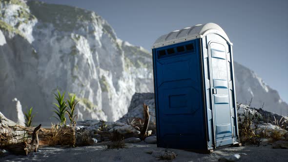 Portable Mobile Toilet in the Beach. Chemical WC Cabin