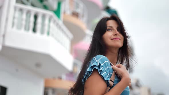 Happy Brunette Travel Lady Walking on Street of Touristic City Enjoying Summer Vacation Slow Motion