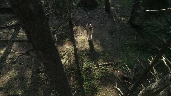 Couple In Forest Aerial View