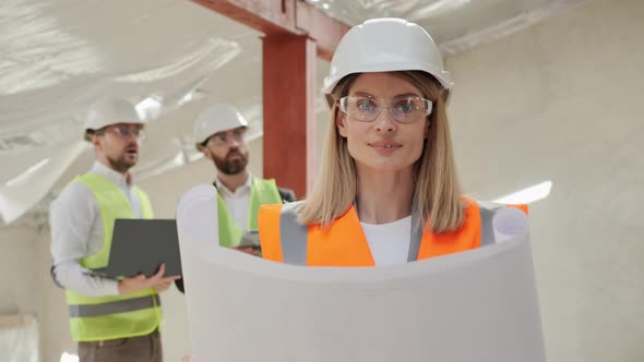 A Young Engineer Looks Into the Camera