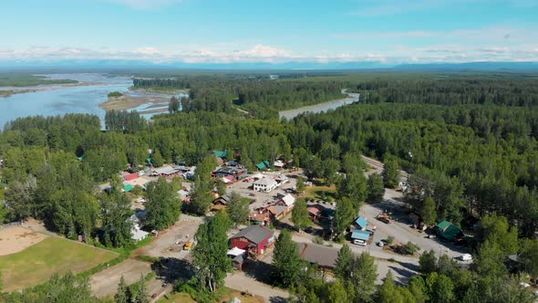 4K Drone Video of Downtown Talkeetna, AK along the Susitna River with Denali Mountain in Distance on