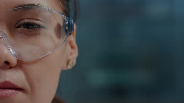 Microbiologist Using Protective Glasses with Virtual Reality