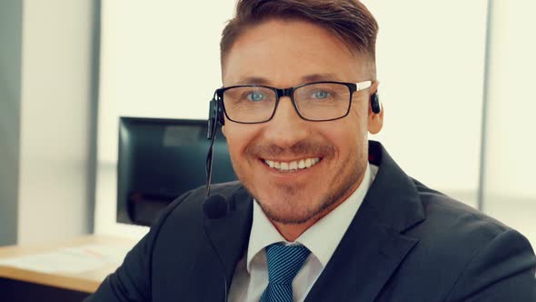 Business People Wearing Headset Working in Office