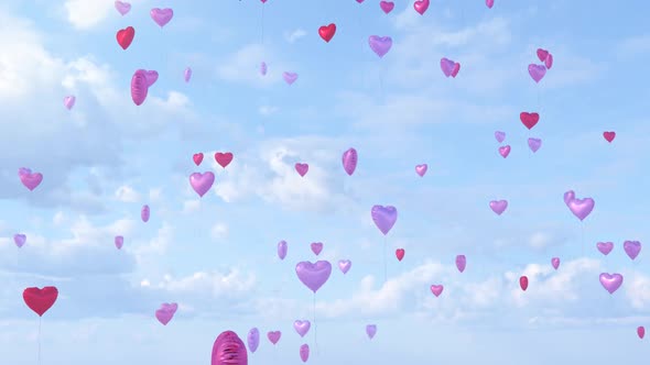 Red Pink Love Heart Shaped Balloons Float Up High Into Blue Cloudy Sky