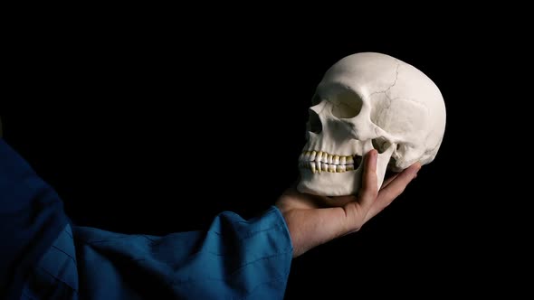 Skull Held Out   Theater Acting Concept