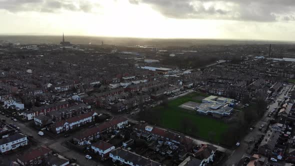 A silhouette of Church of St Walburge, Preston visible in the distance