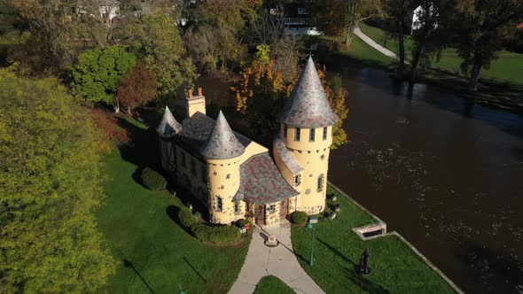 Curwood Castle in Owosso, Michigan with drone shot zooming out.