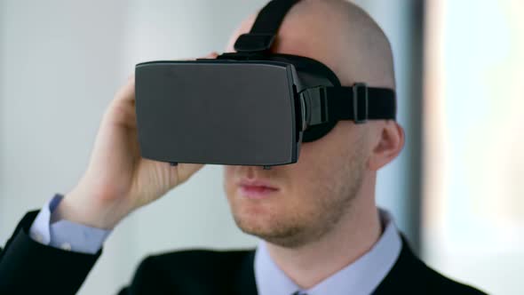 Businessman with Virtual Reality Headset at Office 