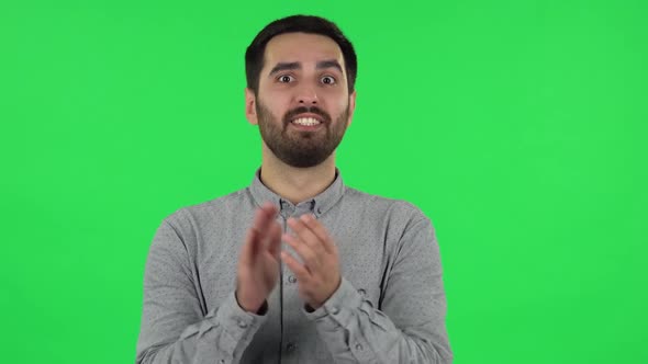 Portrait of Brunette Guy Is Clapping His Hands with Wow Happy Joy and Delight. Green Screen