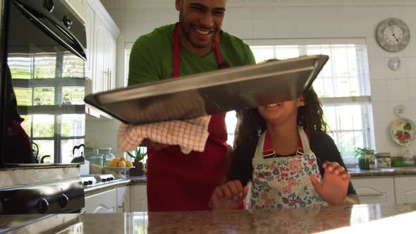 Family making Christmas cookies at home