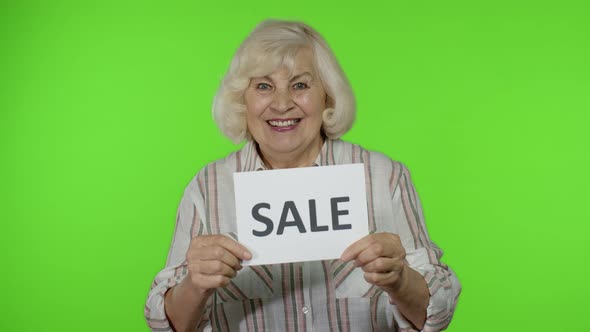 Elderly Stylish Grandmother Smiling and Holding Sale Word Inscription Banner, Black Friday