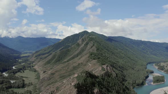 Peak of mountains of Ak-Kem valley with blue Katun river in Altai