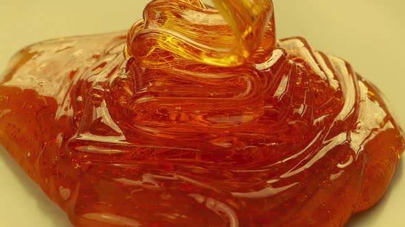 Thick Golden Syrup Pours Closeup Shot