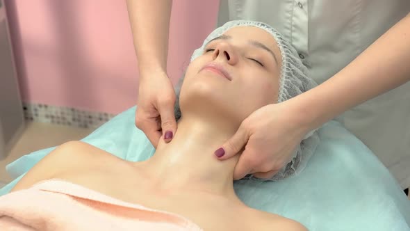 Young Woman Having Neck Massage