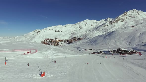 Aerial view of people skiing at a ski resort