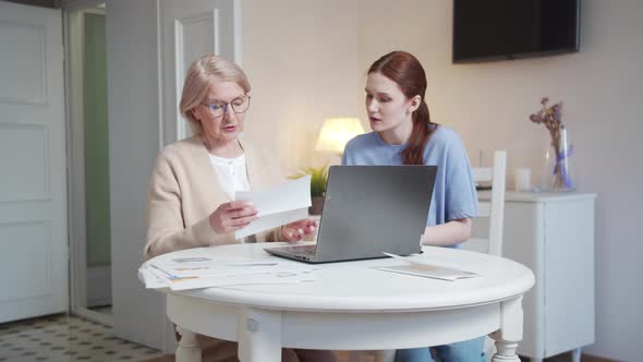 Daughter Helps Her Elderly Mother Pay Bills Online