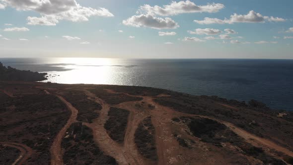 Aerial drone video from northern Malta near the Ghajn Znuber Tower.