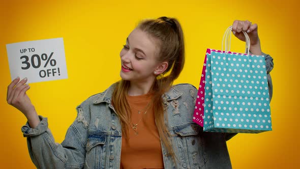 Cheerful Teen Girl Showing Shopping Bags and Up To 30 Percent Off Inscriptions Banner Black Friday