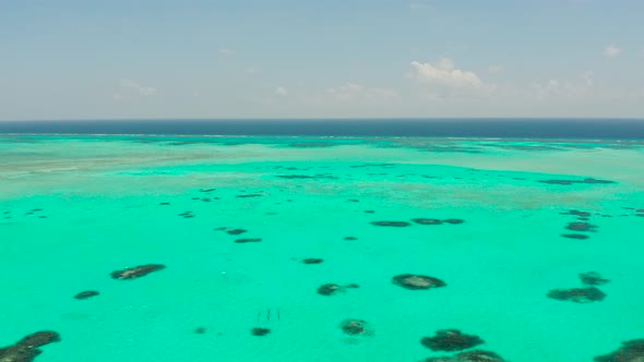 Seascape with Coral Reef and Atoll in the Blue Sea Balabac Palawan Philippines