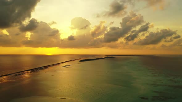 Aerial view texture of beautiful seashore beach time by blue lagoon and white sandy background of a 