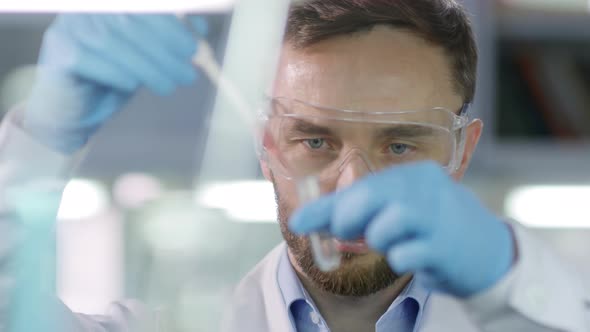 Scientist Carrying out Research in Lab alt