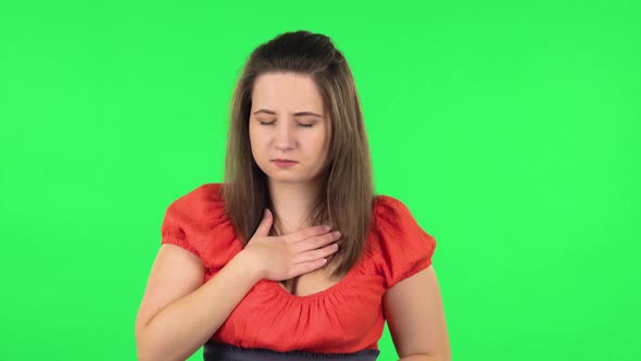 Portrait of Cute Girl Goting a Cold and Sneezing. Green Screen